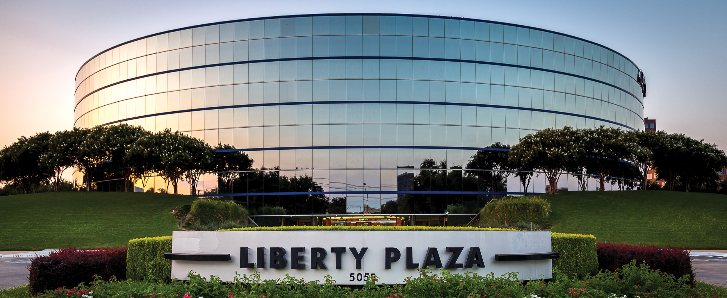 exterior of Liberty Capital Bank at sunset
